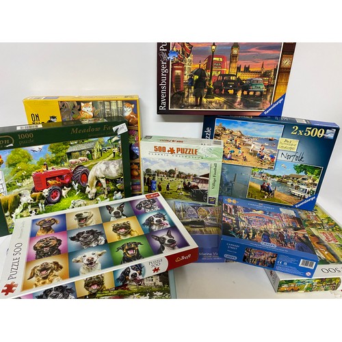 714 - Selection of jigsaws.