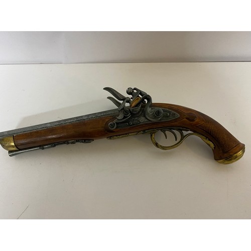 895 - Vintage ornamental double barreled flintlock pistol