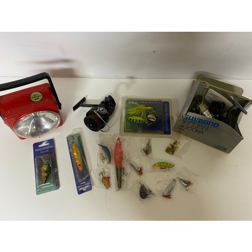 534 - Collection of fishing flies, reels and jacket