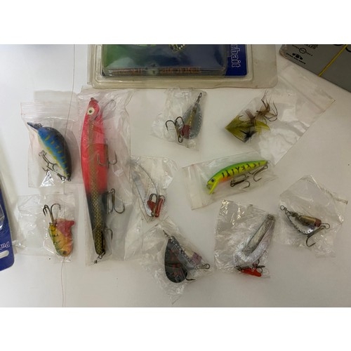 534 - Collection of fishing flies, reels and jacket