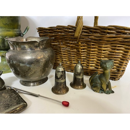 835 - Selection of metalware in wicker basket