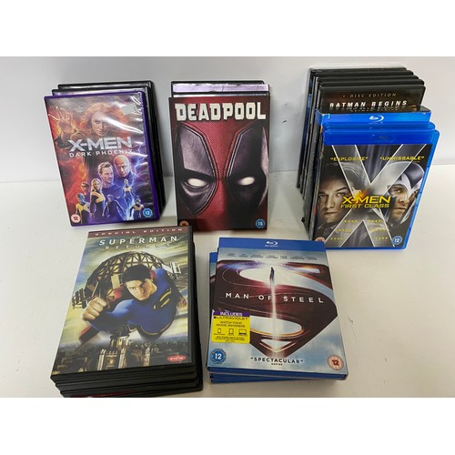 849 - Box of Marvel/DC DVD's and Blurays plus a new Batman figure