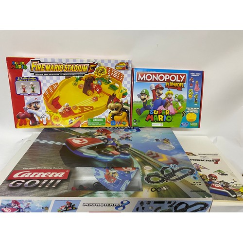 846 - Super Mario games bundle including Monopoly, Carrera racing set etc