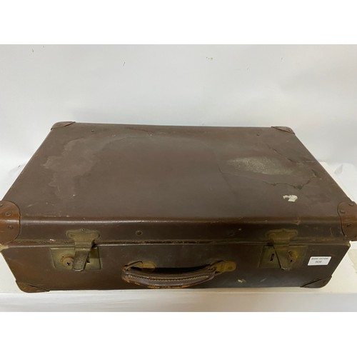 908 - Old suitcase with collection of Military items.