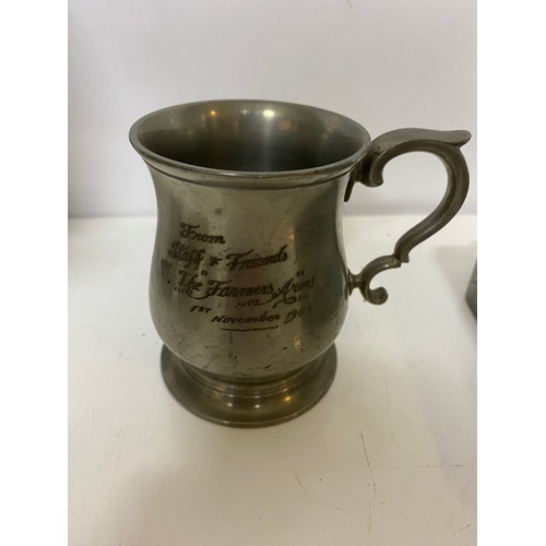 821 - Selection of metalware including scales, tankard and cutlery.