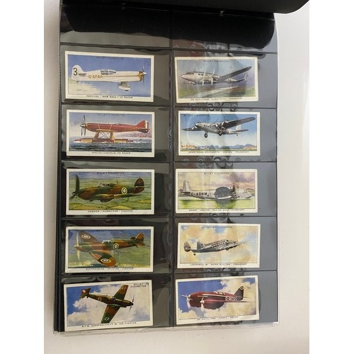 547 - 2 x albums of cigarette cards in official folders.