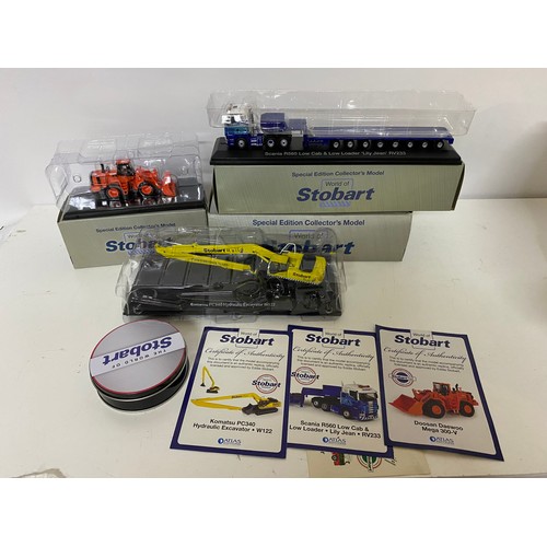 943 - 3 x Atlas Edition Eddie Stobart models and set of coasters. Models include a Komatsu PC340 excavator... 