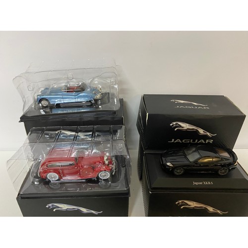 944 - 6 x Atlas Edition Jaguar models and a set of coasters. Models include e type Jaguar, Jaguar XKSS57, ... 