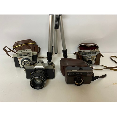 945 - Selection of 4 x vintage cameras and a tripod. Cameras include a Kodak 56X, a Fujica ST605N, a Kodak... 