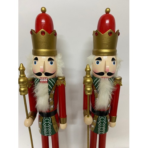 950 - Pair of wooden King Nutcrackers measuring 59 cms tall