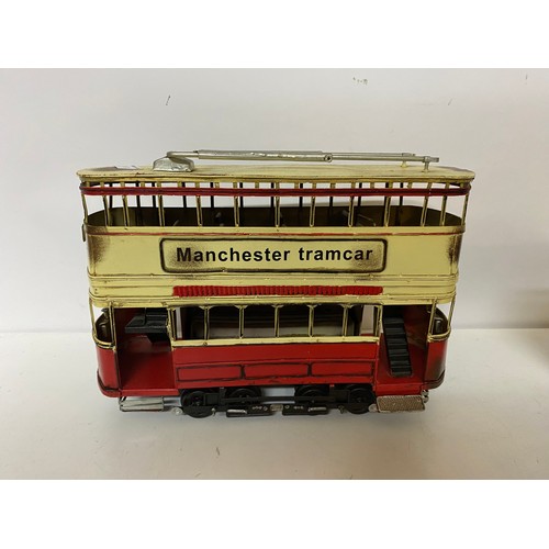 952 - Large metal Manchester Tramcar measuring 34 cms long x 25 cms tall