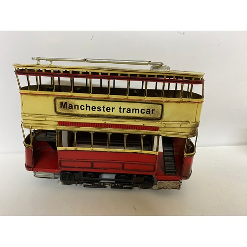 952 - Large metal Manchester Tramcar measuring 34 cms long x 25 cms tall