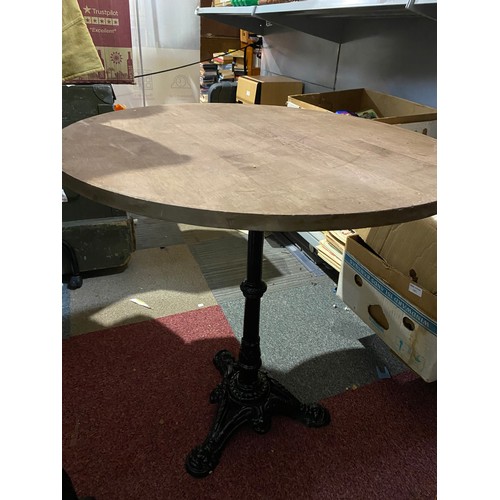 954 - Round wooden top bar table with metal base 70x73cms