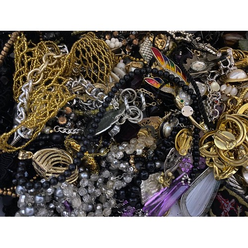 13 - Large collection of costume jewellery in steel container