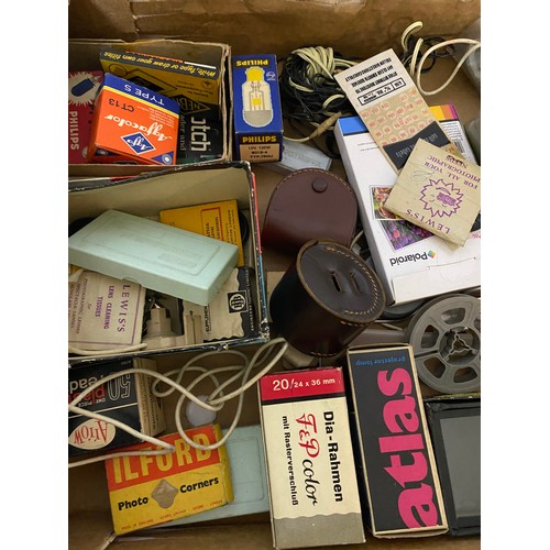 21 - Box of film/photographic paraphernalia.