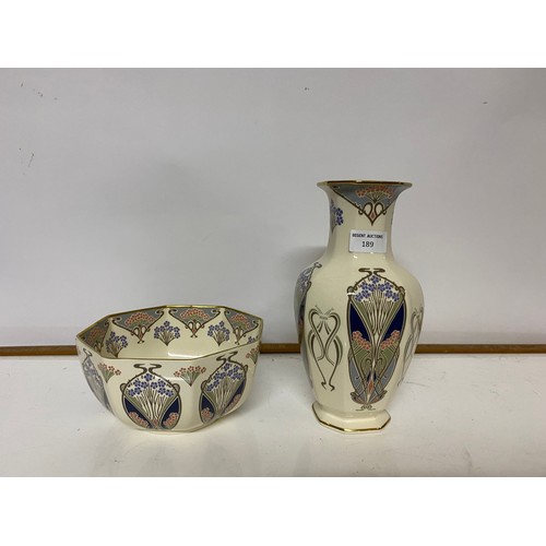 189 - A Liberty wash bowl and vase measuring 27 cms tall