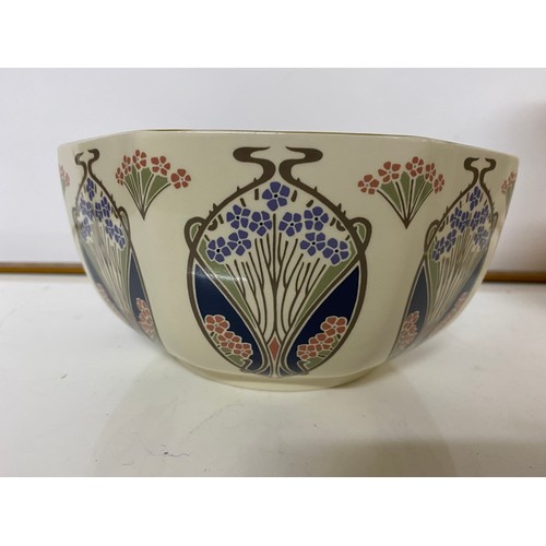 189 - A Liberty wash bowl and vase measuring 27 cms tall