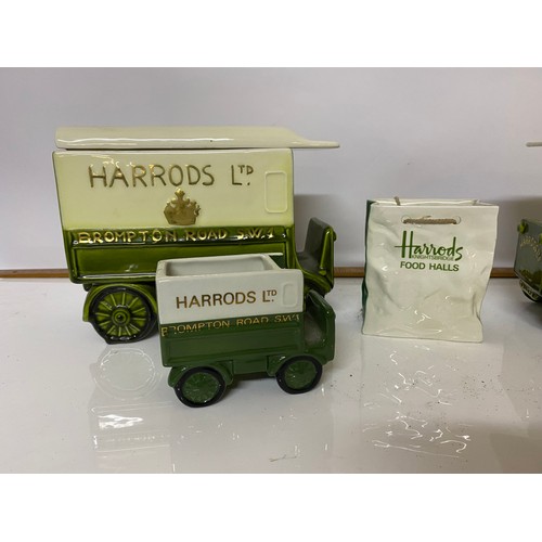 203 - Selection of 5 x pieces of Harrods pottery. Vans measure 22 x 17 cms tall. Some damage to one van