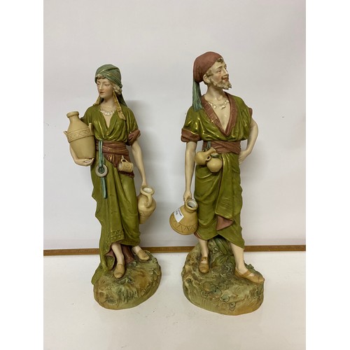 206 - Pair of Royal Dux figurines depicting male and female water carriers