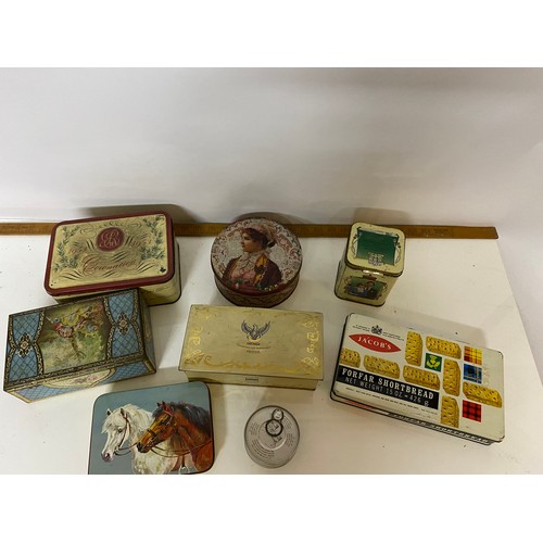 54 - Selection of vintage biscuit tins.