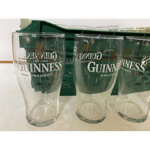 57 - Crate of 12 guinness glasses