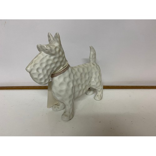 73 - Model of a Westie Dog measuring 25 x 29 cms long