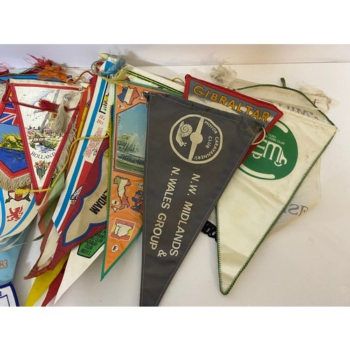 33 - Collection of vintage pennants and patch badges