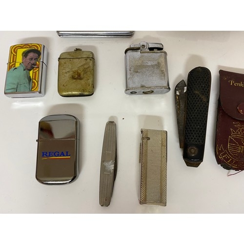 41 - Collection of tobacciana including vesta, lighters, cigarette cases, clay pipe, knives etc