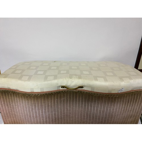 114 - Vintage Lloyd Loom style ottoman with double bow front measuring 90 cms wide