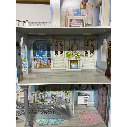 180 - Modern dolls house/castle measuring 82 x 135 cms tall