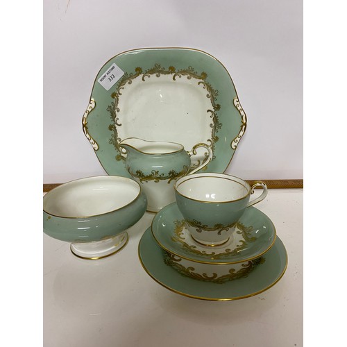 332 - Selection of Aynsley 'Sherwood' design comprising 5 x trio's, milk and sugar bowl and a cake plate