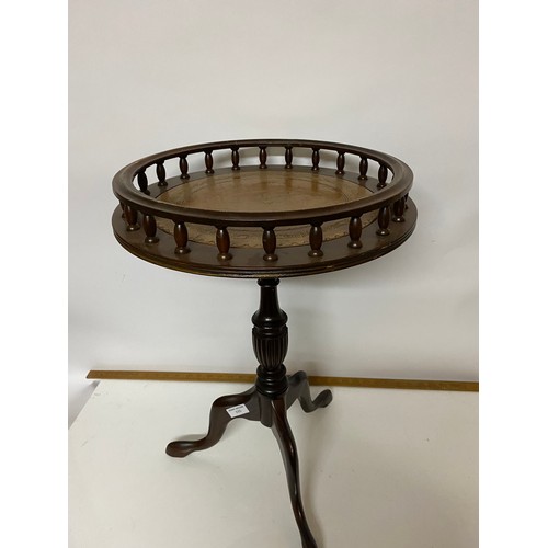 335 - Vintage round lamp table with brown leather top and gallery edge, measures 58 cms tall