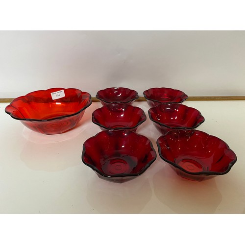 351 - Red glass dessert set comprising of 6 bowls and 1 large bowl.