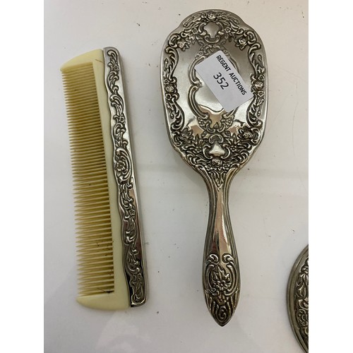 352 - Vintage dressing table set comprising of hand mirror, brush, combe and mirror.