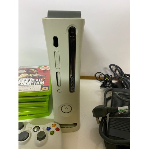 401 - White Xbox 360 with 2 controllers  and dock, leads and 15 games. Fully tested and working