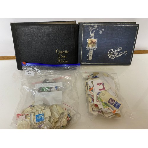 424 - Collection of stamps and 2 x cigarette albums