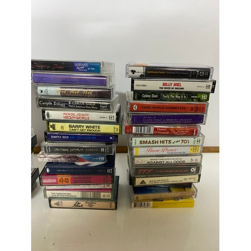 81 - Box of vintage music cassettes