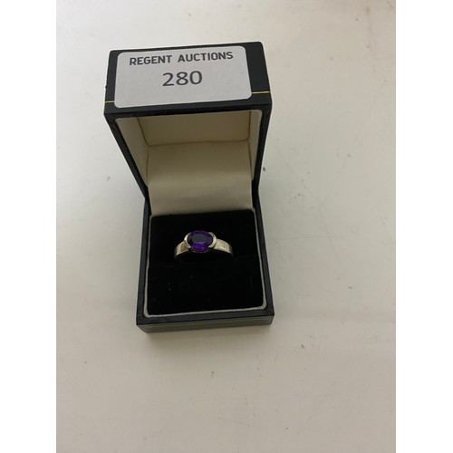 280 - Sterling silver ring with Amethyst/purple gemstone size O