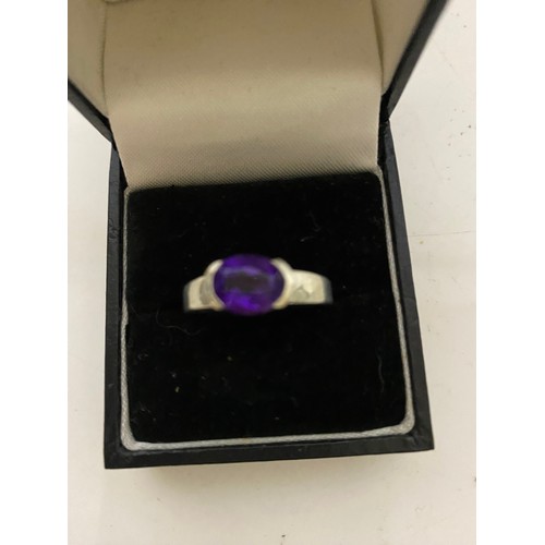 280 - Sterling silver ring with Amethyst/purple gemstone size O