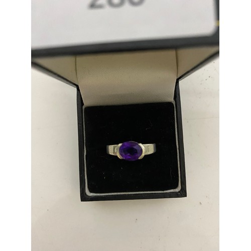 280 - Sterling silver ring with Amethyst/purple gemstone size O