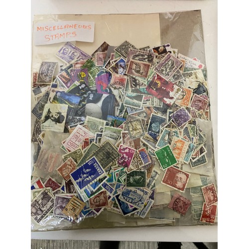 329 - Selection of stamps, cigarette cards, first day covers and postcards.