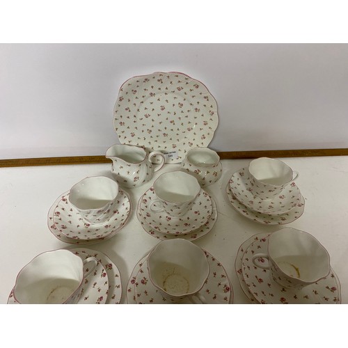 344 - A Queens teaset 'fleur' design comprising 6 x trio's, milk jug, sugar bowl and cake plate