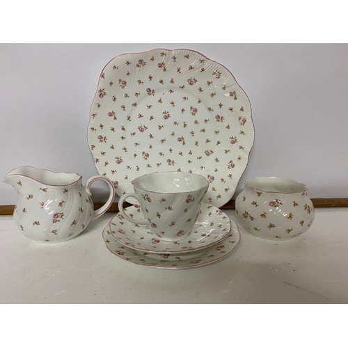 344 - A Queens teaset 'fleur' design comprising 6 x trio's, milk jug, sugar bowl and cake plate