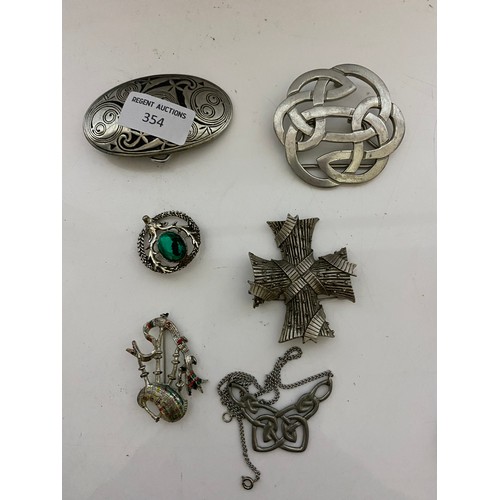 354 - Selection of Celtic style jewellery including belt buckles and brooches