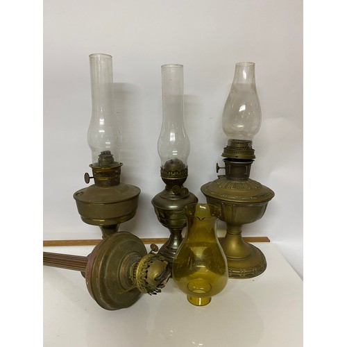 438 - 4 x antique brass oil lamps with original glass funnels