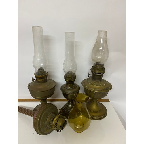 438 - 4 x antique brass oil lamps with original glass funnels