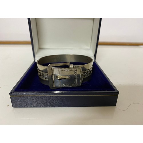 440 - 1970's hallmarked silver buckle bangle