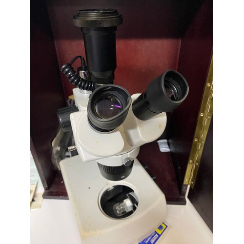 411 - Brunel trinocular microscope in wooden box with instructions