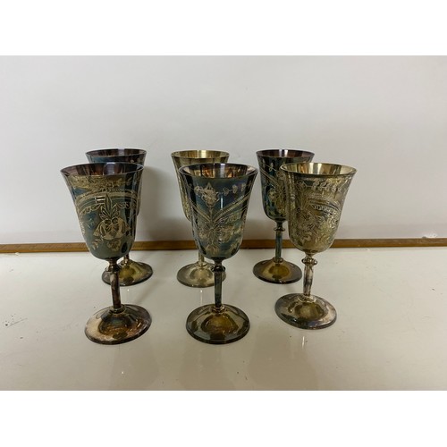 449 - Large selection of metalware including candlesticks, tray and goblets