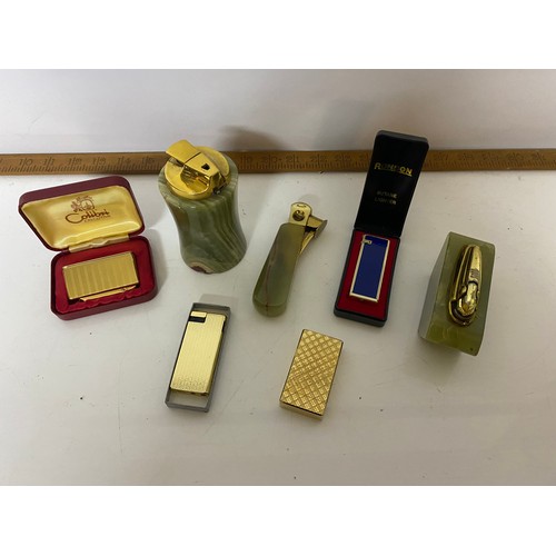 457 - Selection of tobaciana including onyx ashtrays and lighters, glass ashtrays and onyx cigarette box